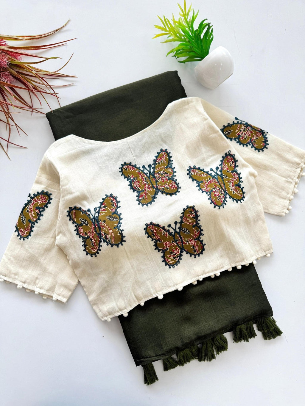 Butterfly and elephant motif blouse design